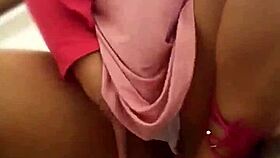 angel lima touches herself on the building stairs