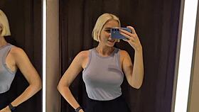 Big tits flash in dressing room with sexy see-through outfit on!