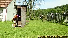 Redhead in threesome blowjob with golden shower and cumshot spray.