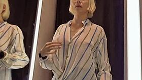Big tits flash in dressing room with sexy see-through outfit on!