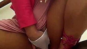 angel lima touches herself on the building stairs