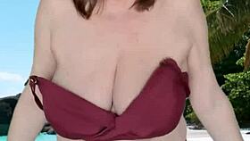 hot granny with huge natural tits teases seductively in tiny bikini.