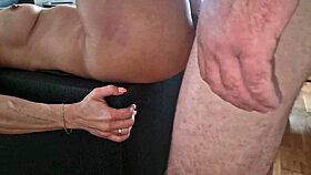 a naked milf lies on the floor in a scene