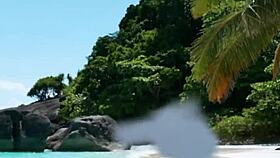 hot granny with huge natural tits teases seductively in tiny bikini.