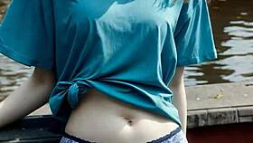 Lingerie models pose gracefully along Amsterdam canals