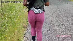 Ebony Prostitute With Big Ass In Leggings Runs Alone In The Forest.