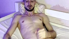 Young Brazilian bodybuilder with small waist jerks off in costume for homemade video