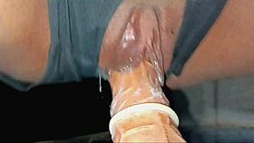 Spreading tight pussy with fake cock for orgasm