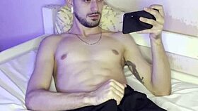 Young Brazilian bodybuilder with small waist jerks off in costume for homemade video