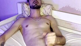 Young Brazilian bodybuilder with small waist jerks off in costume for homemade video