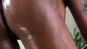 Huge black dick pounds bald black pussy, then leaves cumload on buttocks