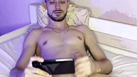 Young Brazilian bodybuilder with small waist jerks off in costume for homemade video