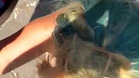 Blonde woman receives facial in public setting