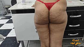 Latina housewife cleans dishes and relaxes at home