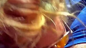 Blonde woman receives facial in public setting