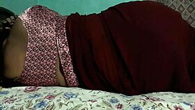 Sanjana aunty shows ass in maroon saree casually