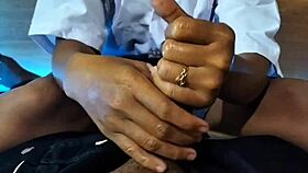 Asian schoolgirl teases and jerks cock in amateur video