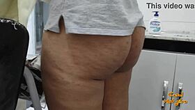 Latina housewife cleans dishes and relaxes at home