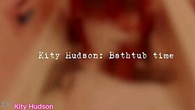 kity hudson bathes in tub, showing trimmed pussy and hairy beaver
