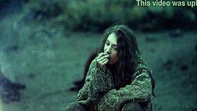 In this fantasy cosplay, the bare maiden MASTURBATES by the CAMPFIRE all alone, showing off her small tits in public