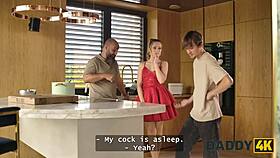 Man, this slutty gf is sucking cock and stripteasing for another right in the same room!