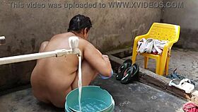 nangi bhabhi bathes outdoors showing her cute pussy.