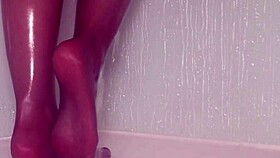 Teasing nylon feet in the wet shower, stockings on toes.