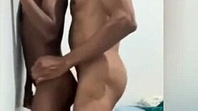 I dominate the skinny Brazilian guy against the wall with strong thrusts.