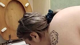 Oh, what a humiliated slut! She licks the toilet in bondage humiliation.