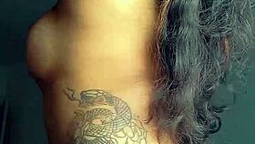 TATTOOED EBONY PROSTITUTE SHOWS OFF ASS BEFORE ANAL FUCKING AND ORAL SEX