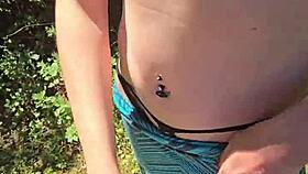 Wife gives quick handjob with pierced nipples while out on a public walk