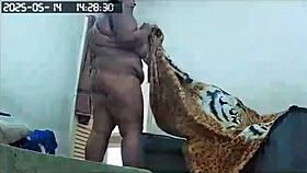 hidden camera catches the brazilian milf maid cleaning naked, showing off her huge tits and big pussy in lingerie