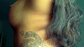 TATTOOED EBONY PROSTITUTE SHOWS OFF ASS BEFORE ANAL FUCKING AND ORAL SEX