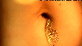 Brunette milf in black dress solo