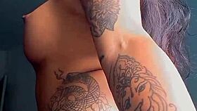 TATTOOED EBONY PROSTITUTE SHOWS OFF ASS BEFORE ANAL FUCKING AND ORAL SEX