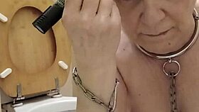 Oh, what a humiliated slut! She licks the toilet in bondage humiliation.