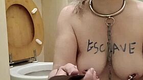 Oh, what a humiliated slut! She licks the toilet in bondage humiliation.