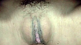 Mature woman in massage room with hairy pussy