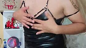 The transsexual dances seductively in crossdressing attire