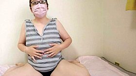 Nasty japanese housewife with big tits masturbating her boobs