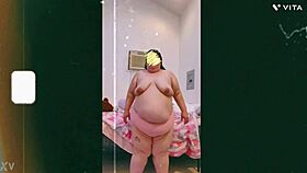 mature cougar does a topless dance on cam