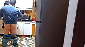 in the kitchen, the wife moans with her lover