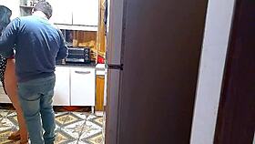 in the kitchen, the wife moans with her lover