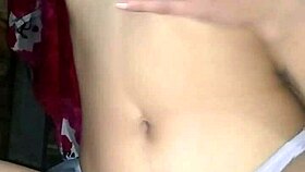 Latina with big tits masturbates her perfect body.