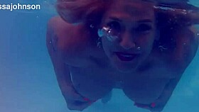 Melissa the mermaid with tattoo in pool