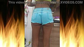 Skinny brunette slut shows hot ass in lingerie and fishnets.