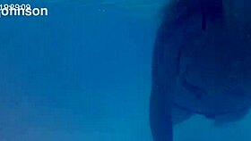 Melissa the mermaid with tattoo in pool