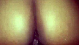 mature ebony couple bent over in a wild frenzy with big cock.