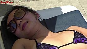 Jenny Marie wears a sexy wet bikini in public outdoor settings