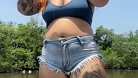 fishing in short shorts in the usa with exhibitionist flashing.